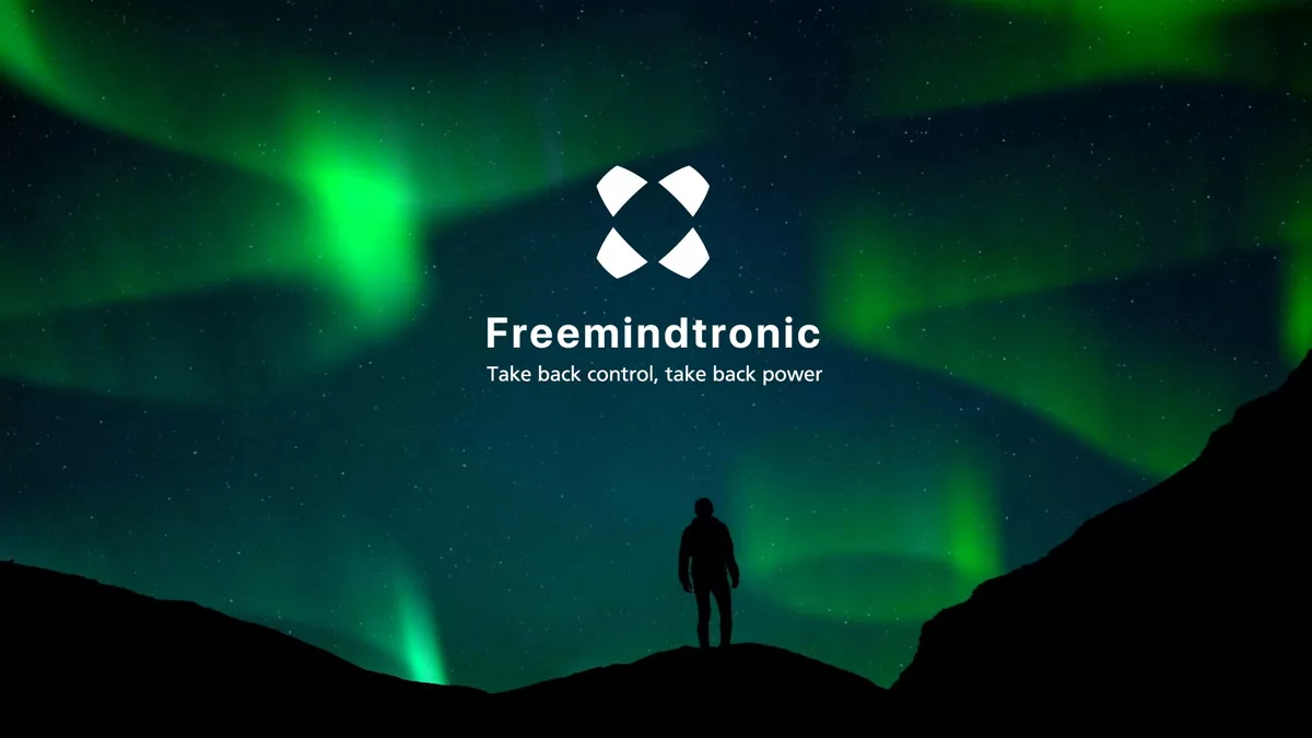Freemindtronic empowerment against aurora borealis backdrop, coming soon.