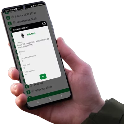 Right hand holding an Android NFC phone displaying the SeedNFC application by Freemindtronic, showing the balance of an Ethereum cryptocurrency wallet.